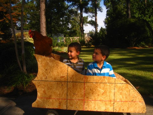 Quick, Trish! To the Batmobile!