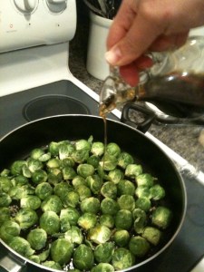 Step 2: add sprouts cut side down and drizzle more oil on top