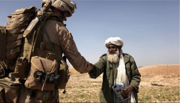 Lt. Mark Greenlief tries to make friends with the locals
